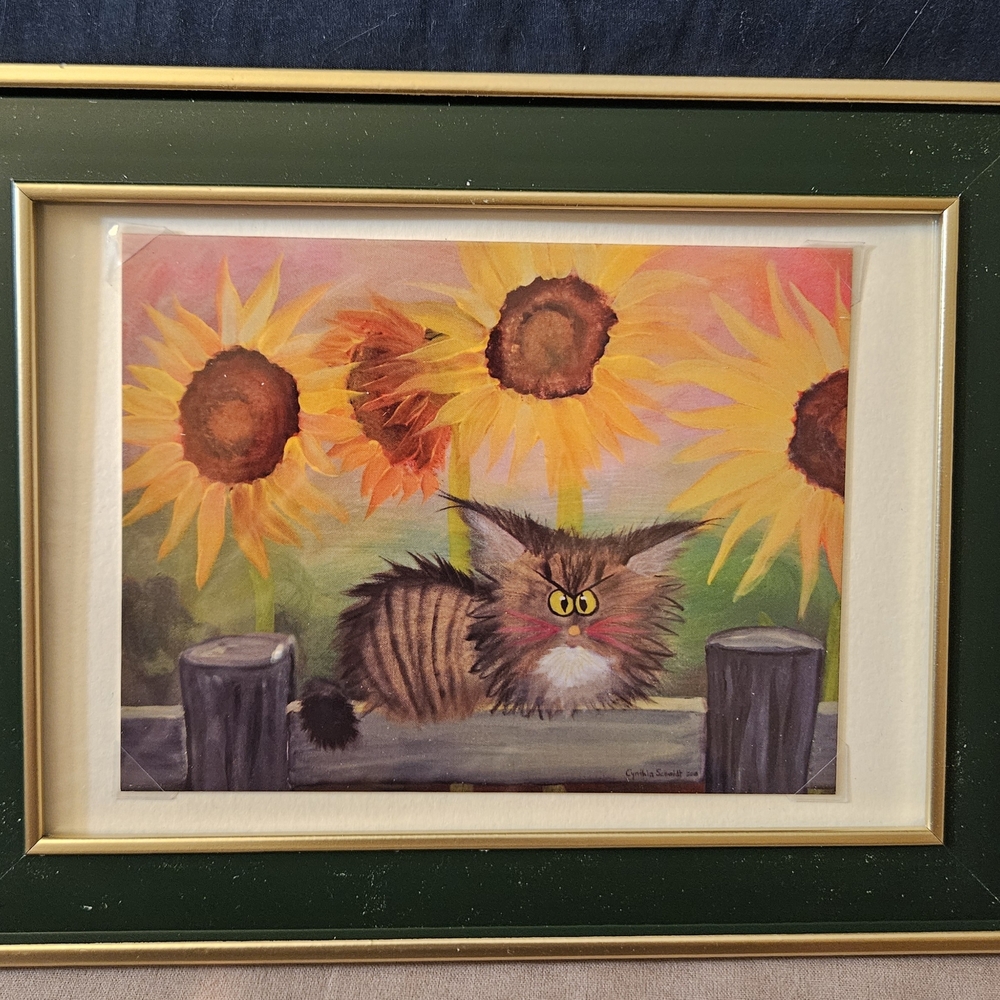 Cranky Grey Cat And Sunflowers